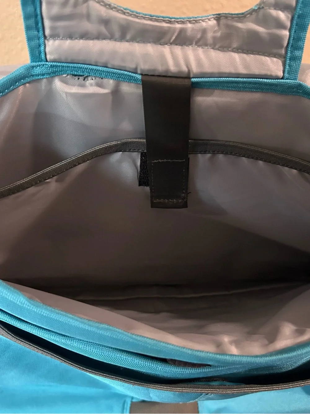 Patagonia Teal Messenger Bag with Reflective Trim